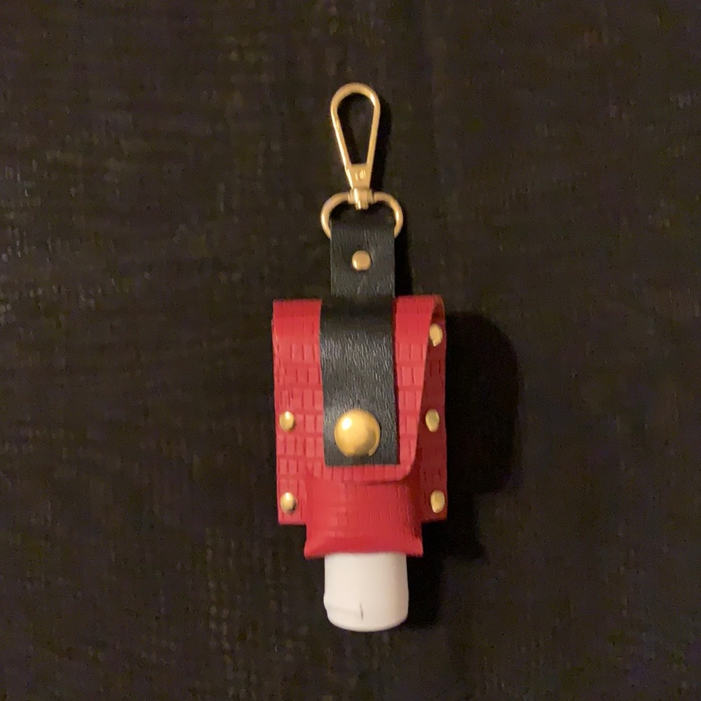 New Sanitizer Holder- Handmade Real Leather. Comes with 1.5 oz plastic bottle.